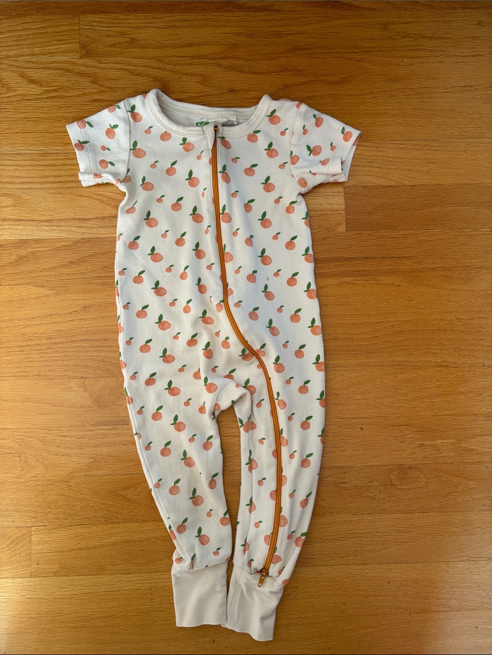 Peach-Print Short-Sleeve Footie in White with Orange Accents